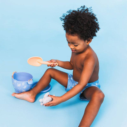 Dinosaur beach bucket and spade play set for children. Silicone.