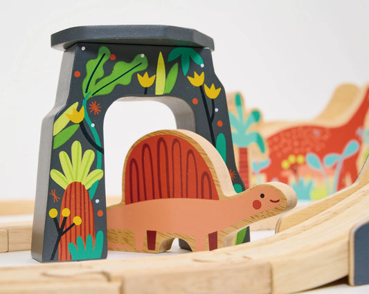 Wooden toy dinosaur on a track with colorful background. Large train track. Perfect gift.