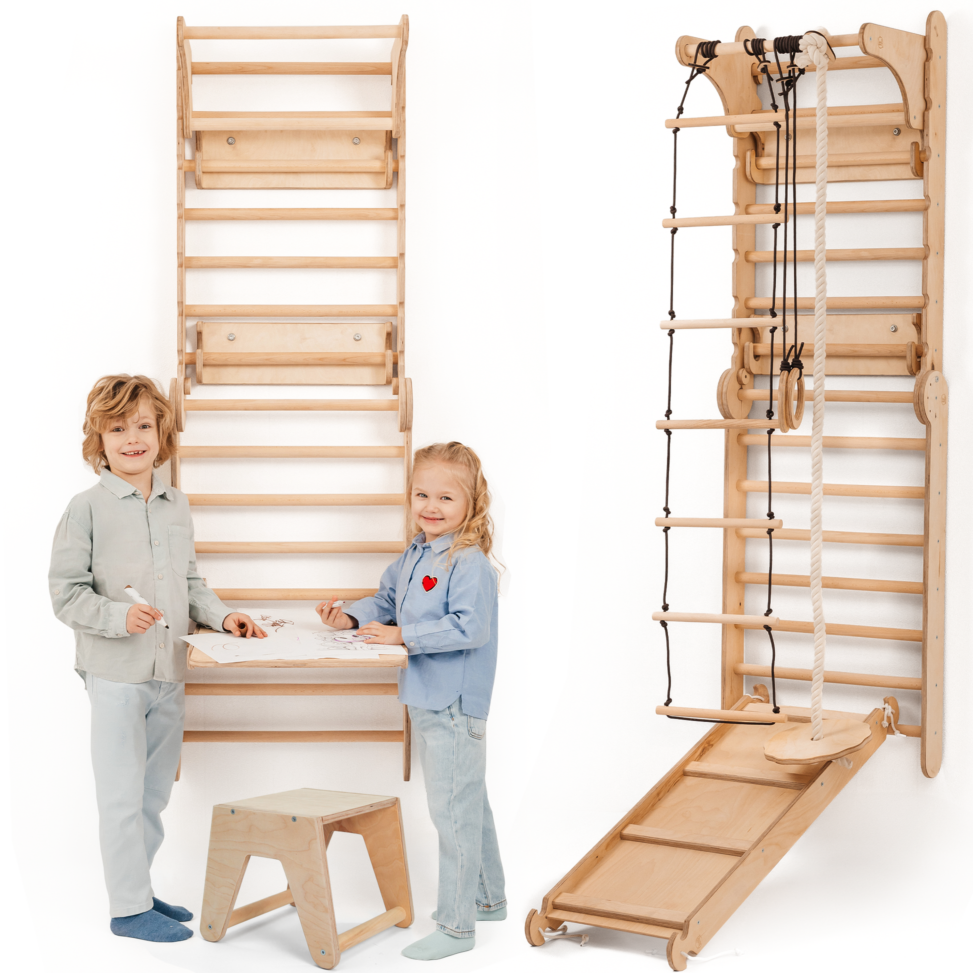 Children standing next to a wooden climbing wall and play set on a white background
