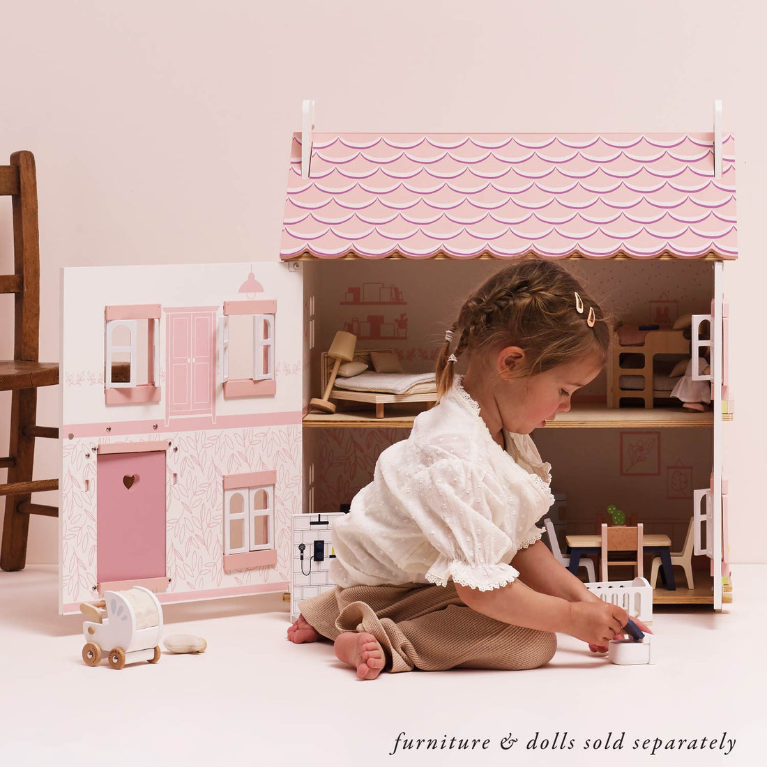 Premium wooden dolls house from Mucky Wolf UK — Sophie's Dolls House by Le Toy Van in white and pink