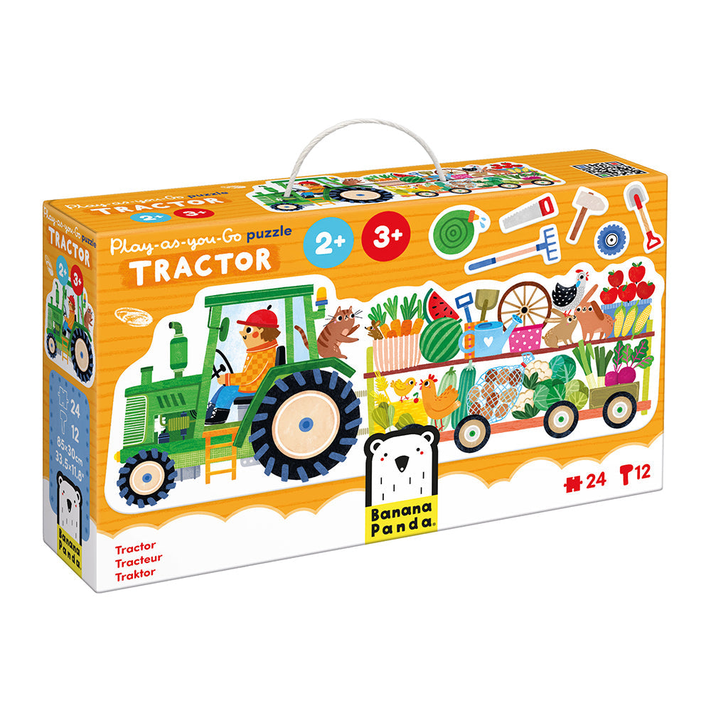 Banana Panda children's wooden puzzle box titled 'Tractor', featuring a colorful illustrated tractor and trailer scene on the front, with a white carrying handle on top, photographed on a clean white background.