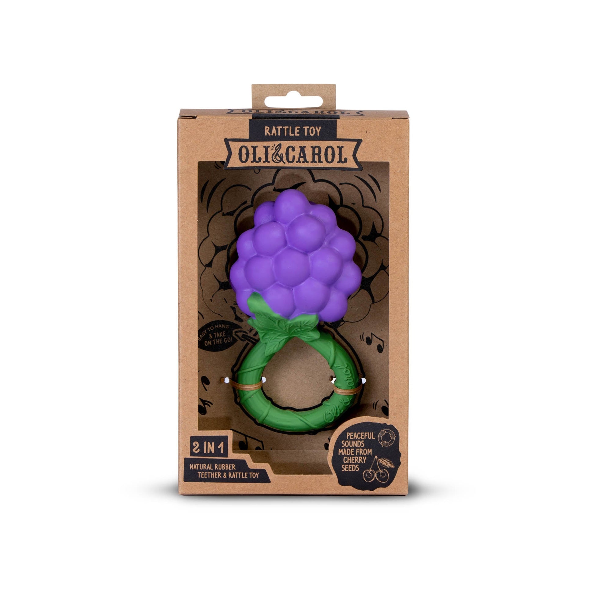 Purple and green rattle toy in Oli & Carol packaging on a white background