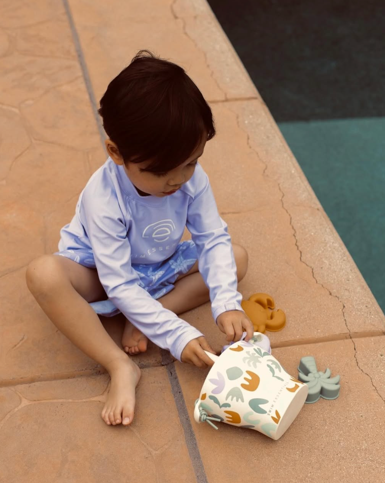 Beach bucket and spade play set with abstract pattern and silicone moulds. Toddler friendly. 