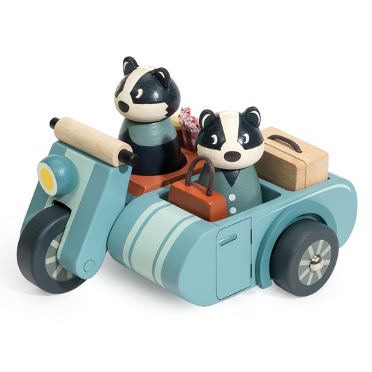 Toy motorcycle with two animal characters and a sidecar on a white background