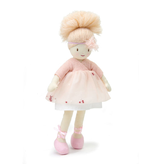 Stuffed doll with blonde hair, pink dress, and ballet shoes on a white background