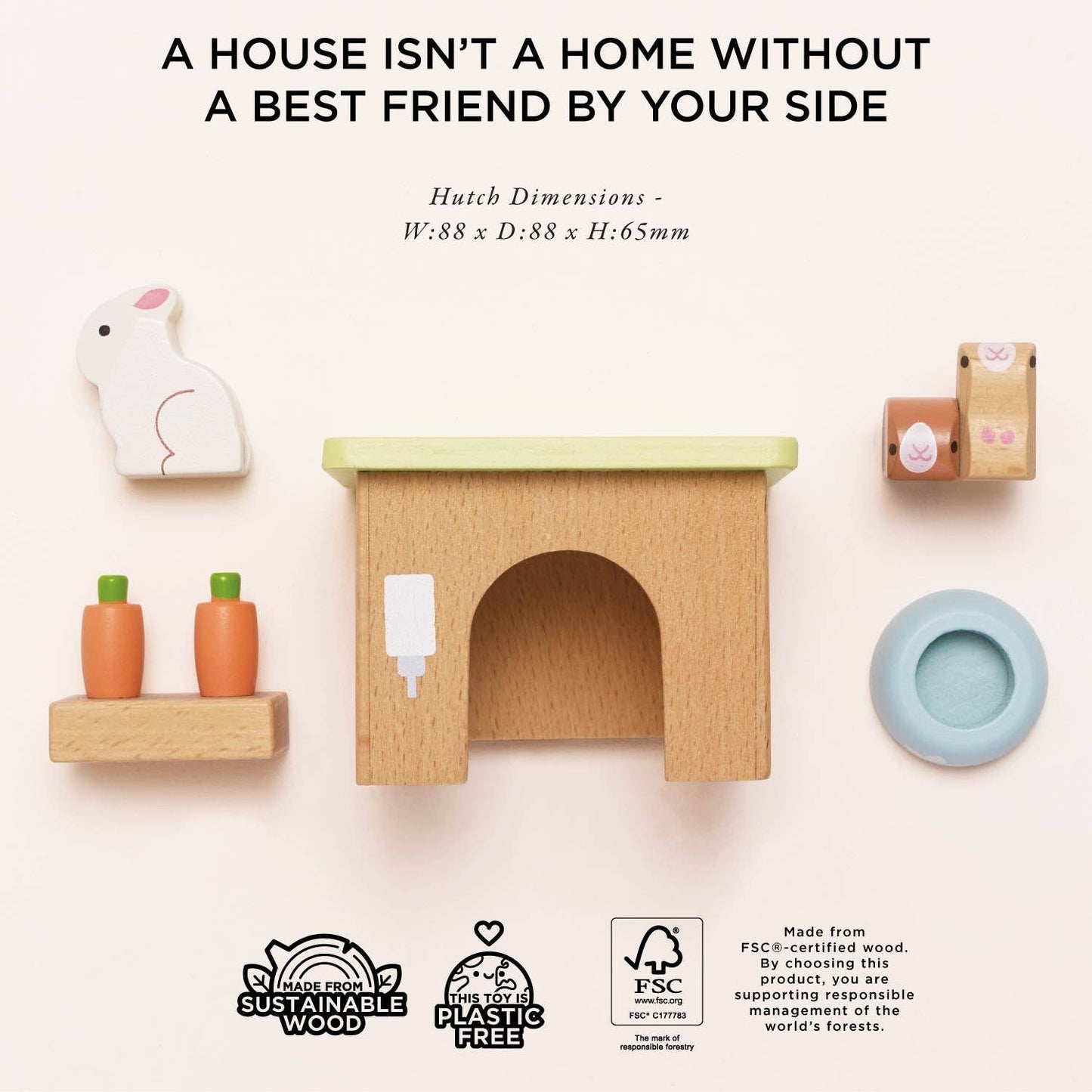 Wooden pet house with accessories on a white background, featuring text about sustainability and FSC certification.