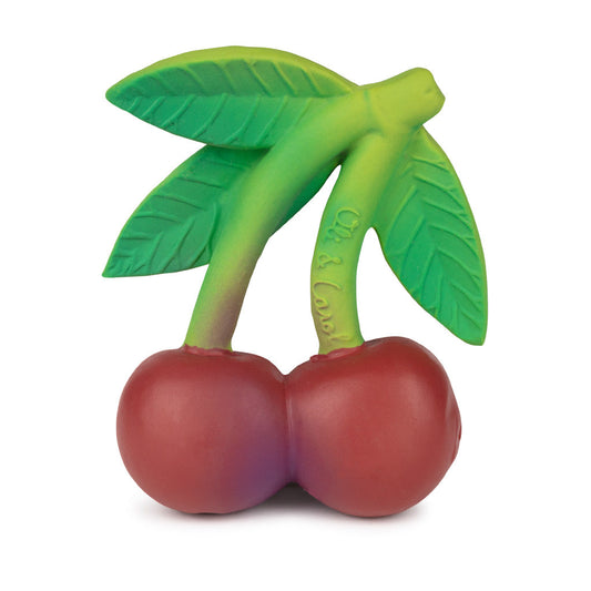 Toy shaped like a cherry with green leaves on a white background
